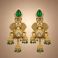 Antique gold peacock triple jhumka earrings with emerald green drops