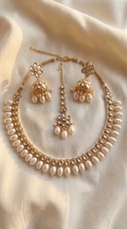 Noor Bridal Set — Gold Kundan Necklace, Jhumka Earrings & Maang Tikka with Pearl Drops