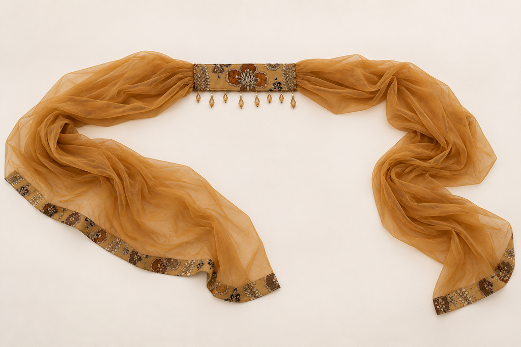 Sheer mustard scarf with an embroidered central neck panel, neck-panel beads and patterned fabric end borders.
