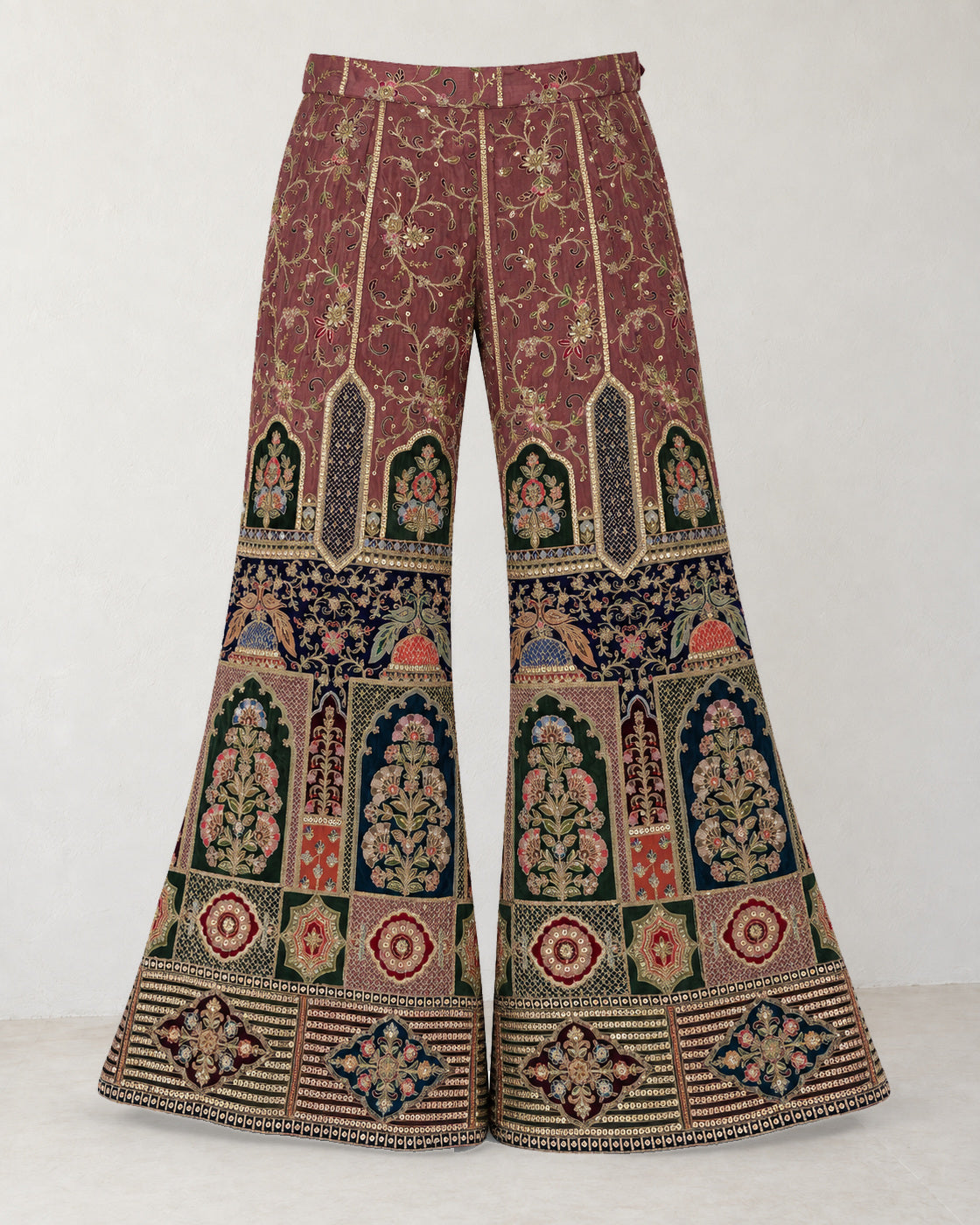 Digital garment presentation: Wide flared palazzo trousers shown alone with floral vines, decorative lower panels and complete hems.