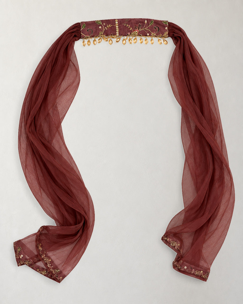 Digital garment presentation: Wine-coloured scarf with an embroidered central band, bead drops, sheer lengths and decorated ends.