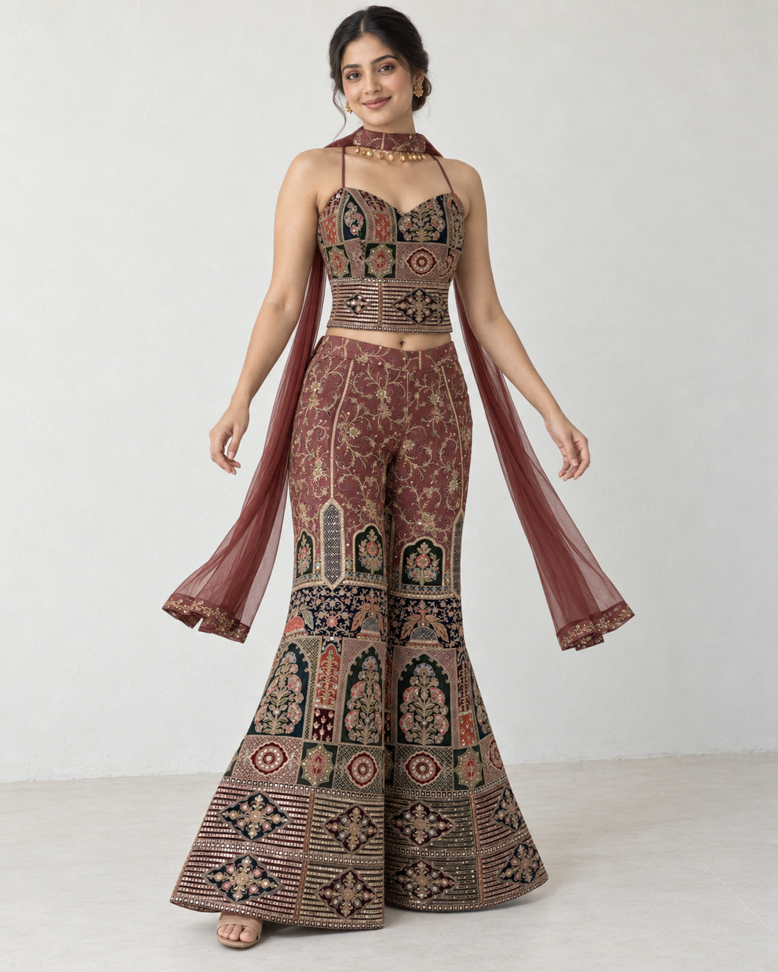 AI-styled model view: Woman in a gentle turning pose with wide trouser legs and sheer scarf lengths moving beside her.