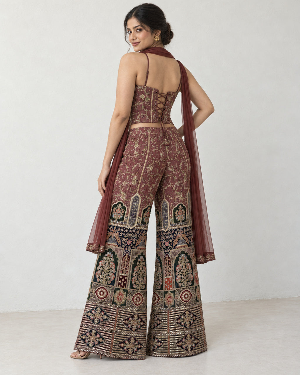 AI-styled model view: Rear three-quarter view of a woman looking over her shoulder, showing the lace-up top and flared trousers.