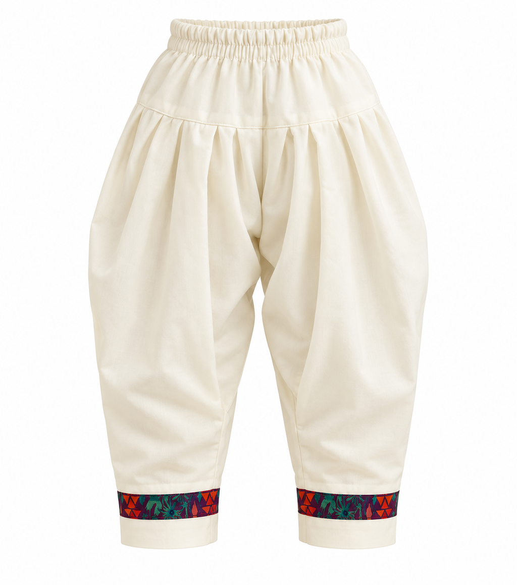 Plum | Salwar pants | Ivory salwar trousers for the Rangoli Girls Tassel Salwar Suit with elastic waist and plum multicolored ankle bands.